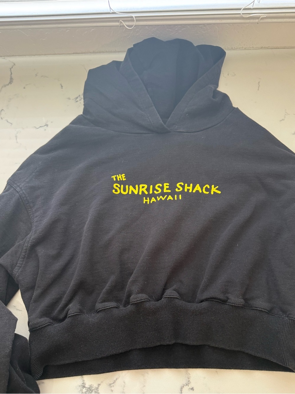 Black Crop Hoodie with Yellow Sunrise Shack Logo